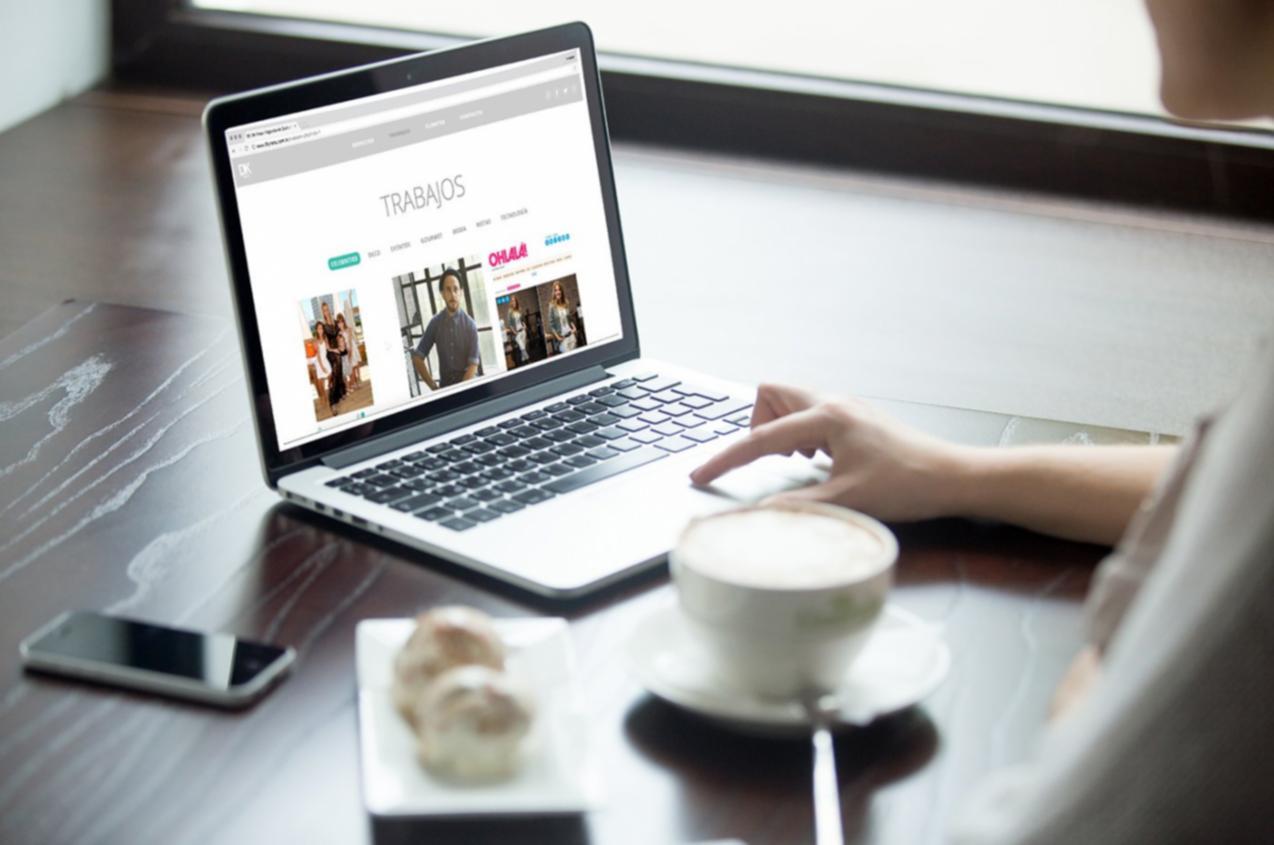 Person reviewing financial documents and planning budget